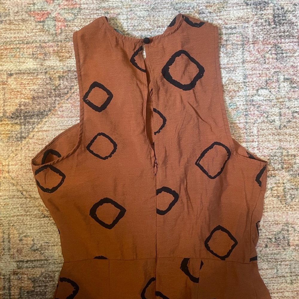 Anthropologie Rust Orange Geometric Twist-Halter Jumpsuit - Picture 8 of 8